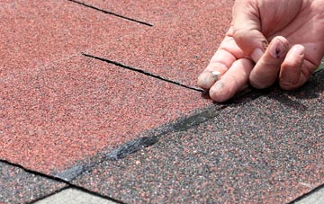 The City asphalt roof repairs